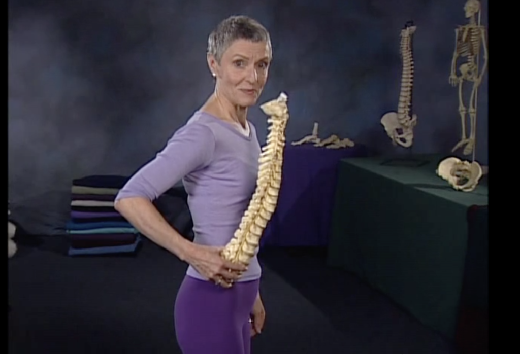 Jean Couch holding a spine